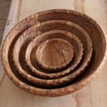 Top down view of a set of nested spalted beech bowls